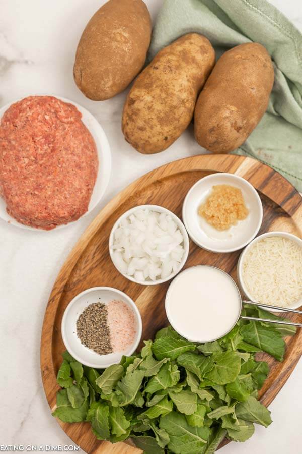 Ingredients needed for Zuppa Toscana Soup - Italian Sausage, Olive Oil, Minced Garlic, Onion, Russet Potatoes, Salt and Pepper, Chicken Broth, Kale, Heavy Whipping Cream, Parmesan Cheese