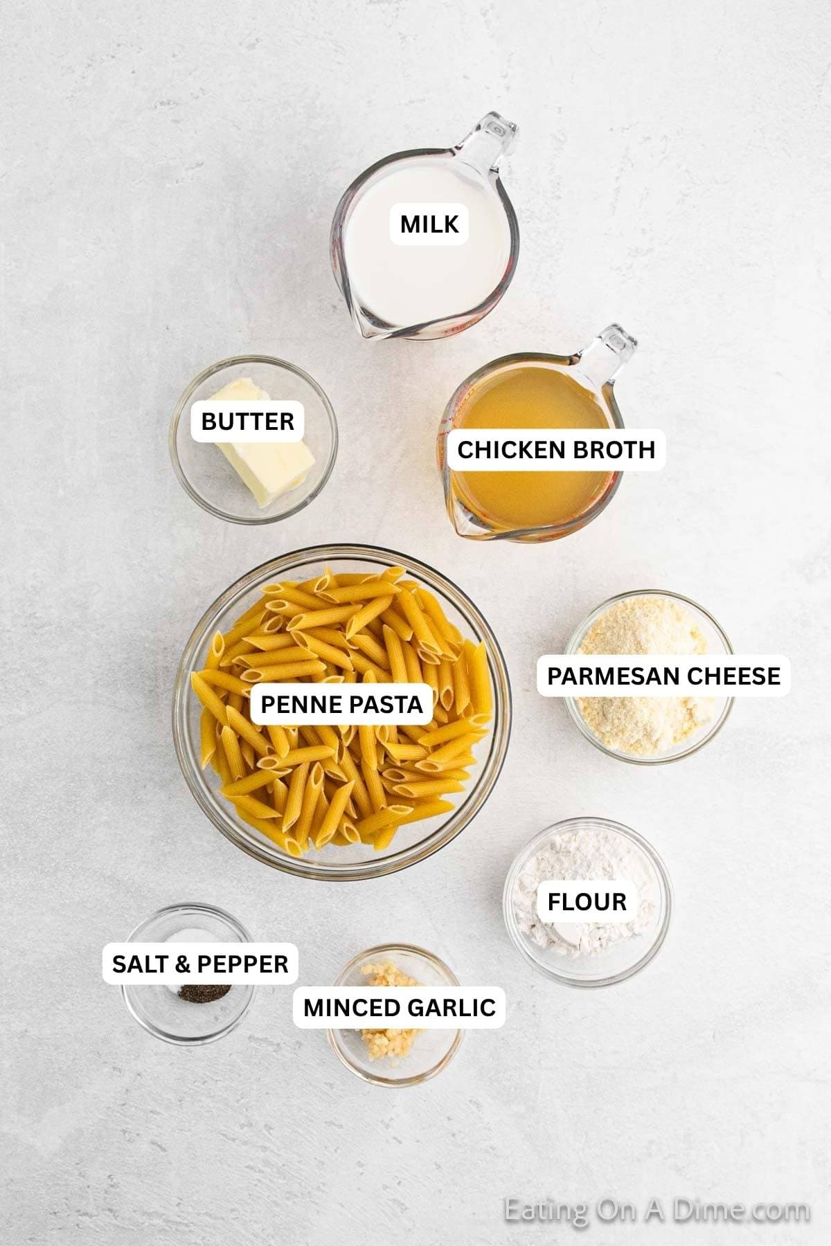 Ingredients for recipe: milk, butter, chicken broth, penne pasta, parmesan cheese, flour, salt, pepper and minced garlic. 