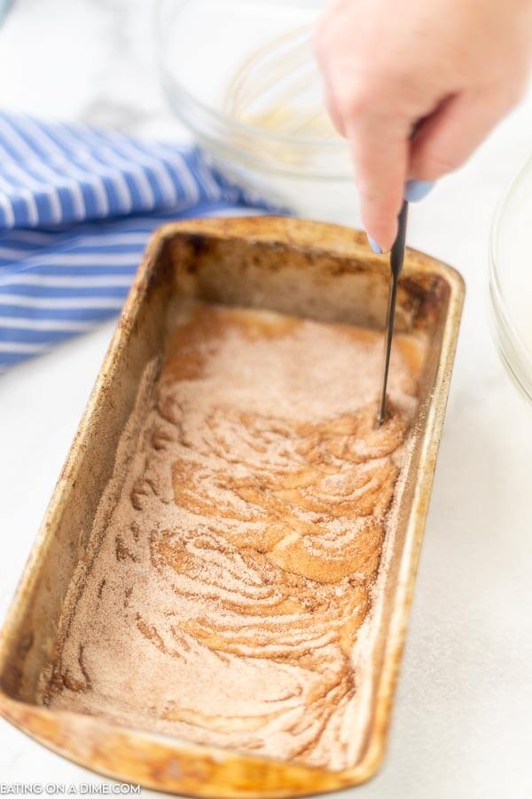 The process of swirling in the cinnamon mixture in the batter. 