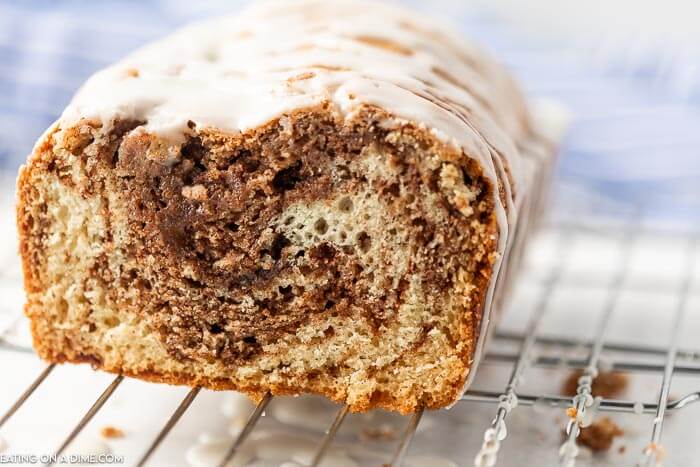 Close up image of sliced bread on a cooling rack. 