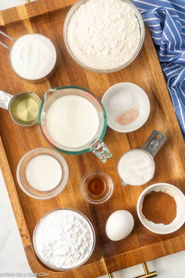 Ingredients needed - flour, sugar, baking soda, salt, milk, egg, vegetable oil, sugar, cinnamon, powdered sugar, milk, vanilla extract