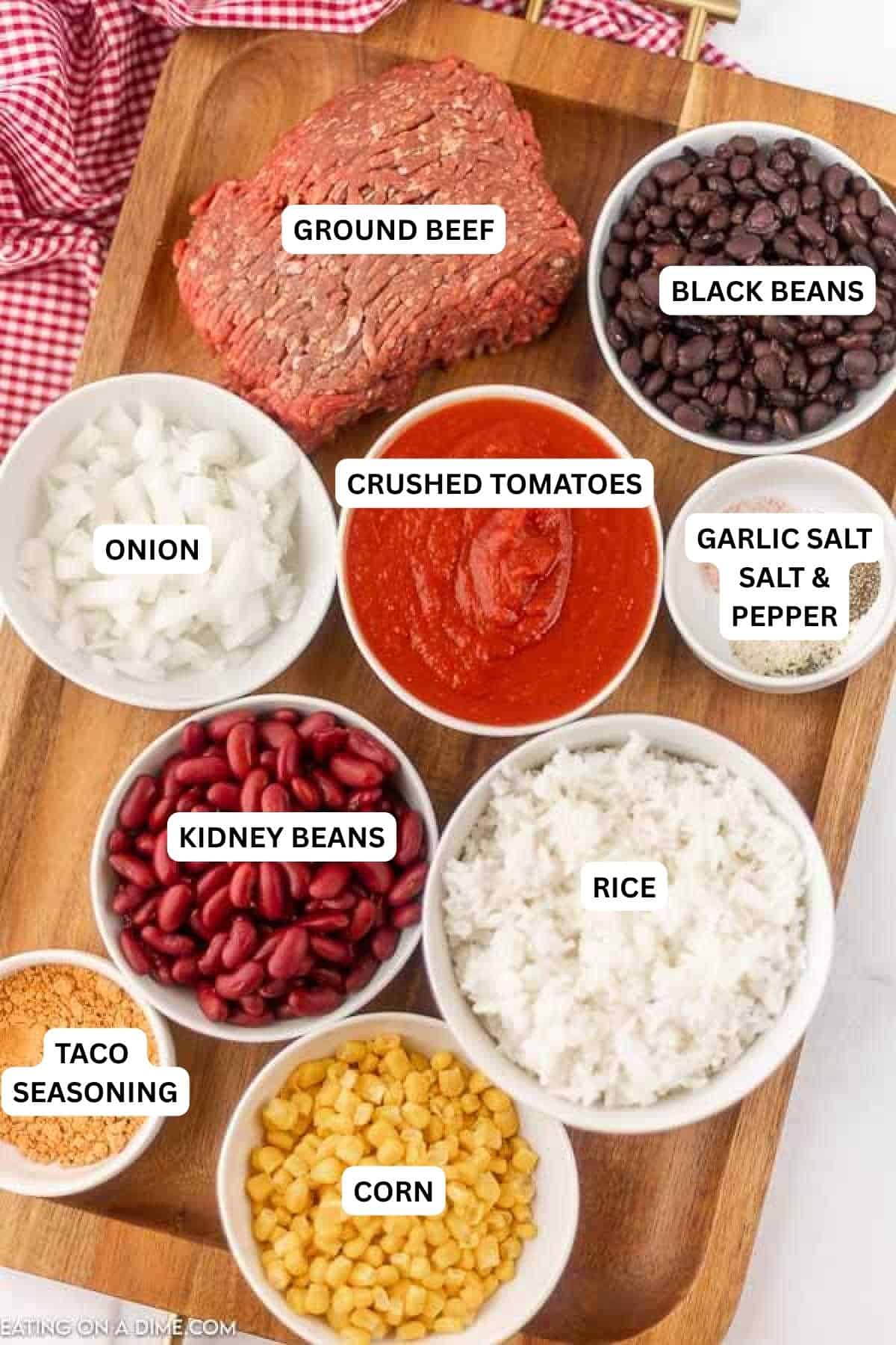 Ingredients for recipe: ground beef, black beans, onion, crushed tomatoes, garlic salt, salt, pepper, kidney beans, rice, taco seasoning and corn. 
