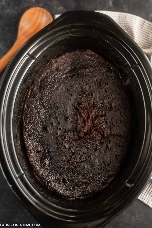 Close up image of chocolate lava cake in the crock pot. 