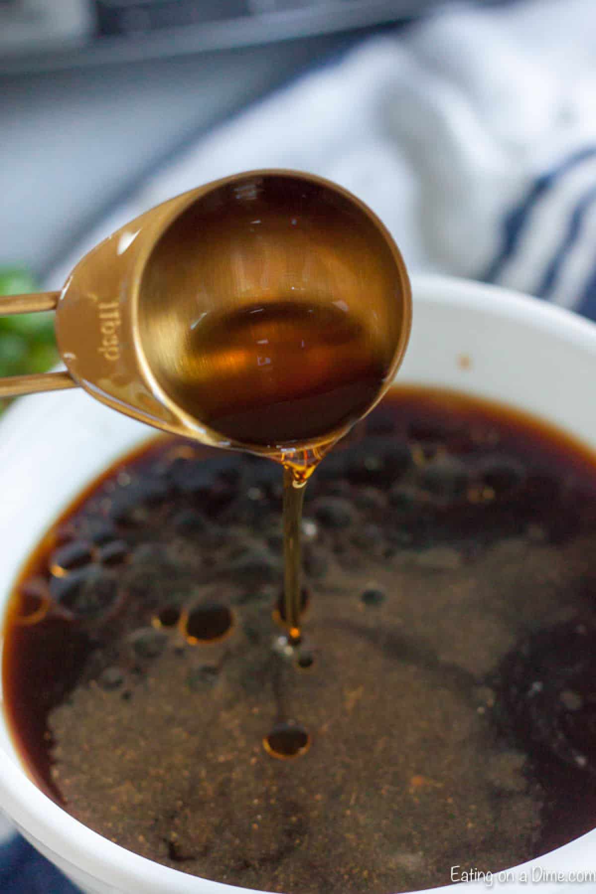 Close up image of the mixture for sesame beef being mix together. 