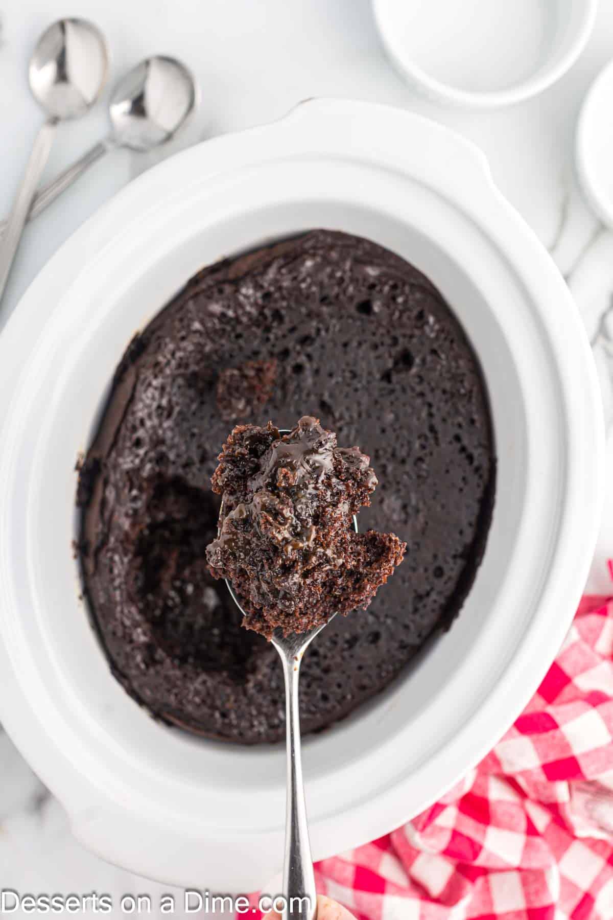 Chocolate lava cake with a serving on a spoon