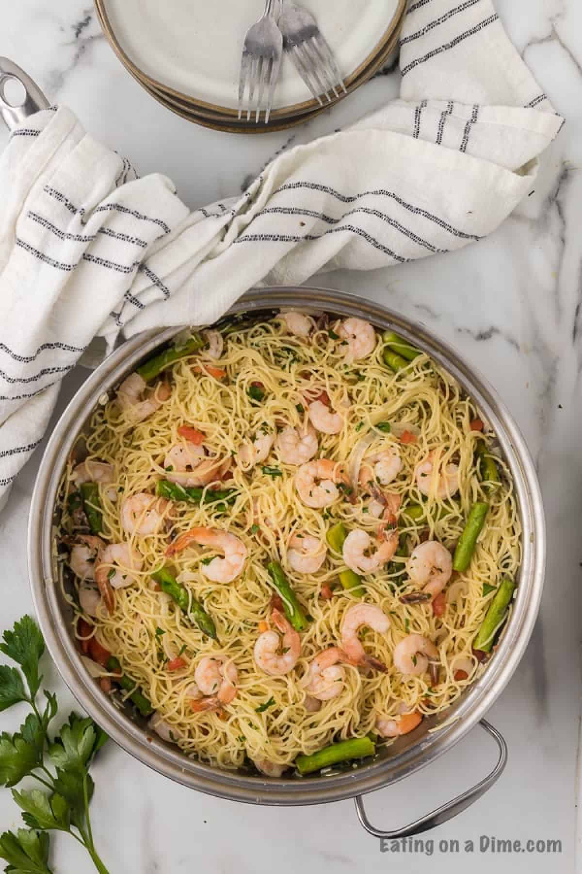 Skillet of shrimp scampi.