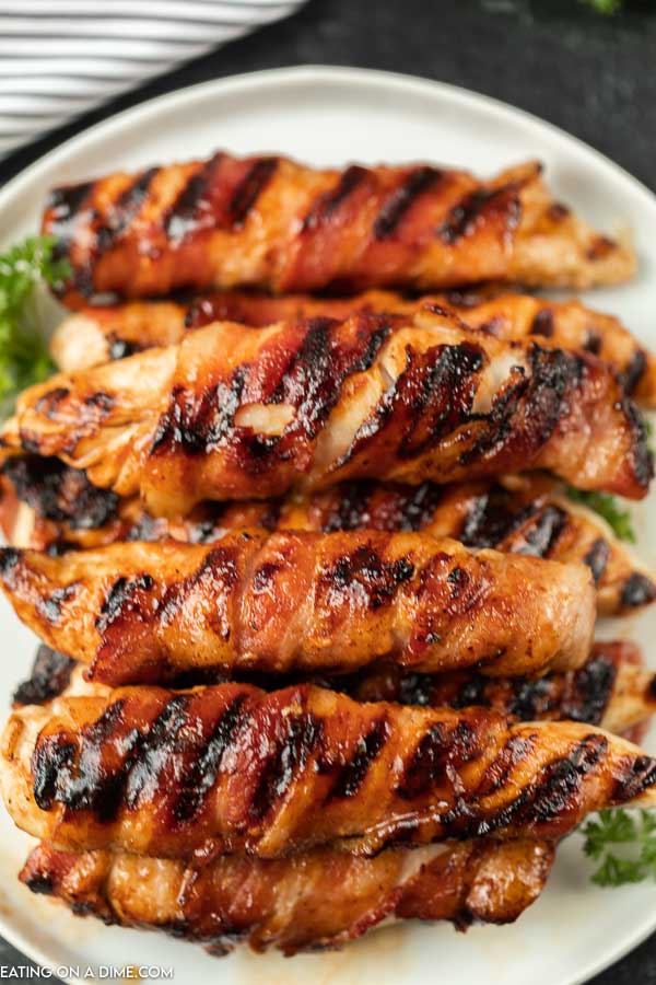 Grilled Bacon Wrapped Chicken Tenders on plate.