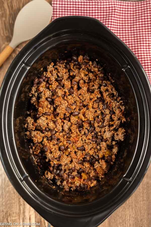 Close up image of taco meat in a crock pot. 
