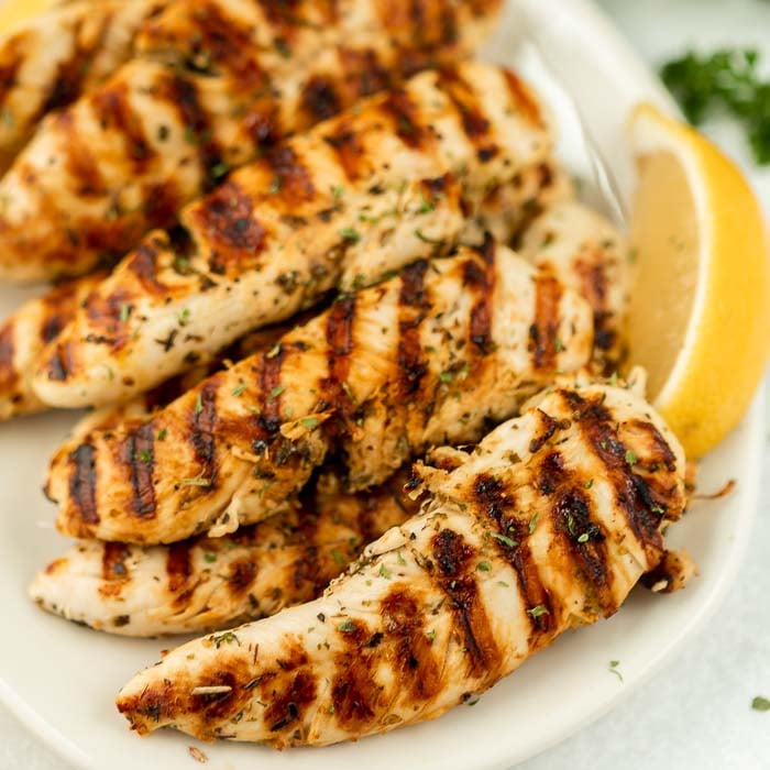 Grilled Chicken Tenders on a plate. 