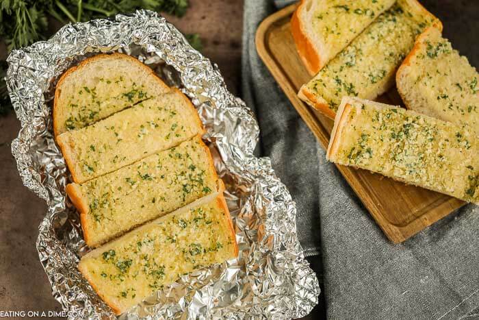 Slices of grilled garlic bread in foil. 