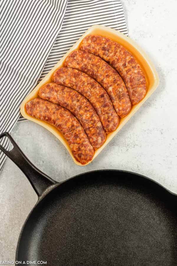 Ingredients needed  - uncooked italian sausage and a iron skillet. 