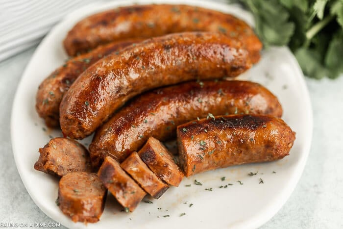 Close up image of italian sausage on a white plate. 