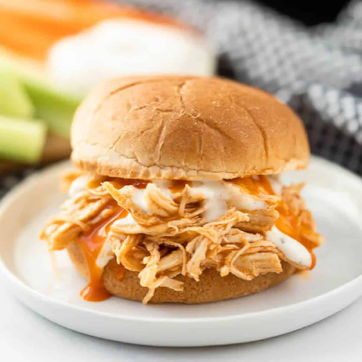 Instant pot Buffalo chicken sliders on a plate.