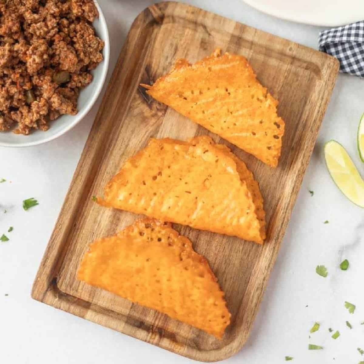 Three keto taco shells arranged together and ready to serve.