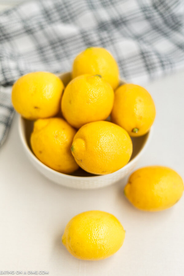 Close up image of a bowl of lemons