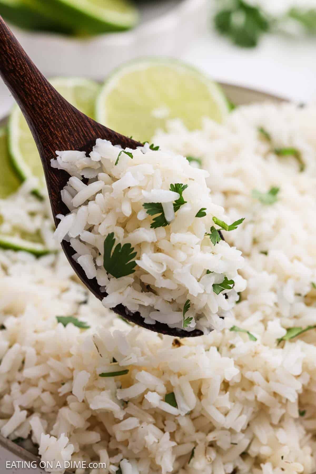 Serving of cilantro lime rice over the bowl.
