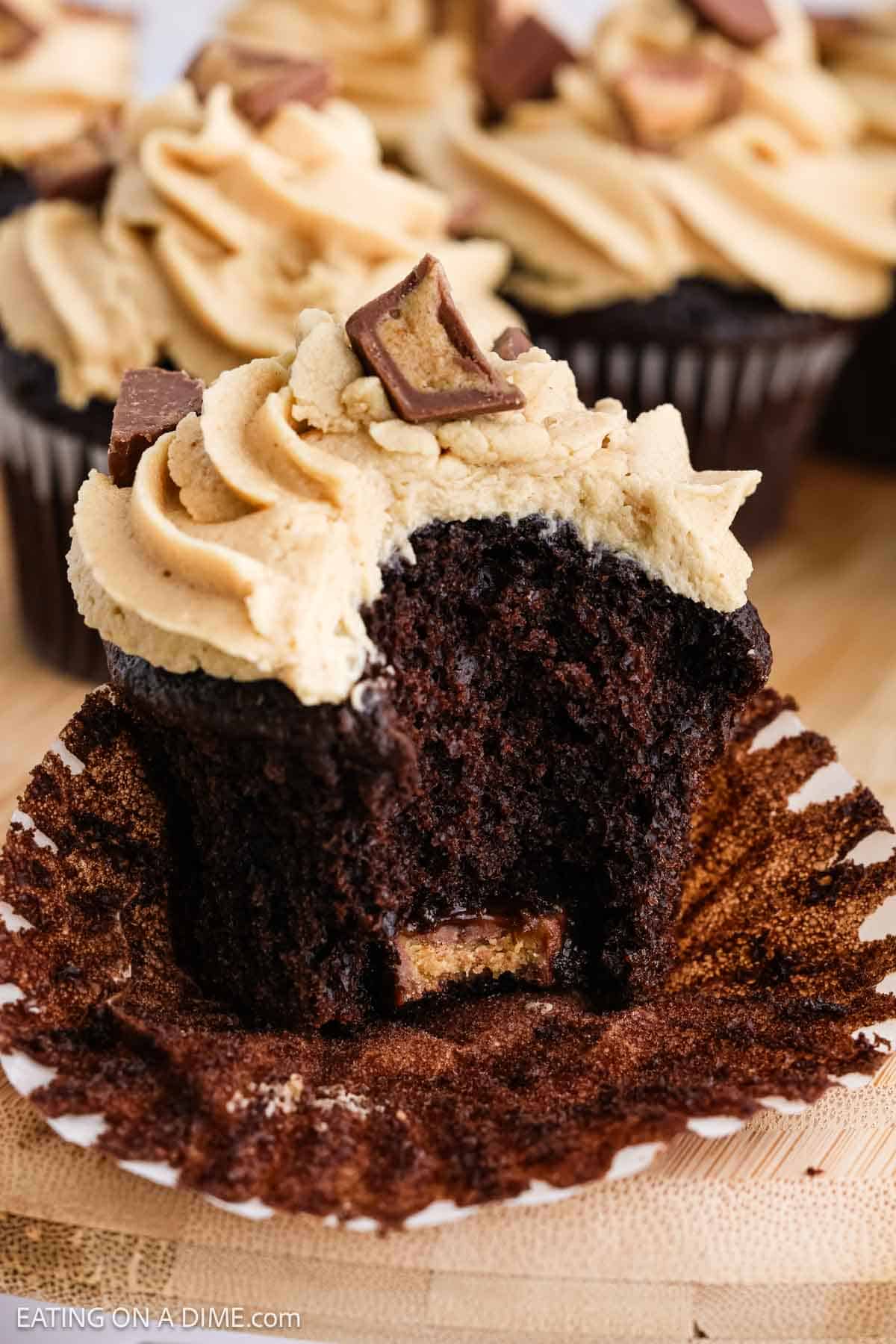 Chocolate Cupcake topped with peanut butter frosting and mini Reese's Peanut Butter Cup