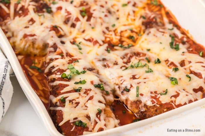 Chicken Parmesan in a white baking dish.