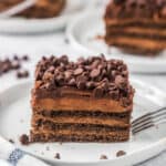 Piece of chocolate icebox cake on a white plate.