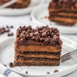Piece of chocolate icebox cake on a white plate.