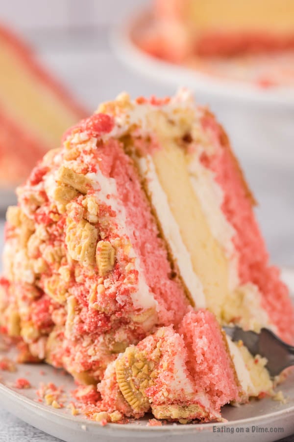 Close up image of a slice Strawberry Shortcake Cheesecake