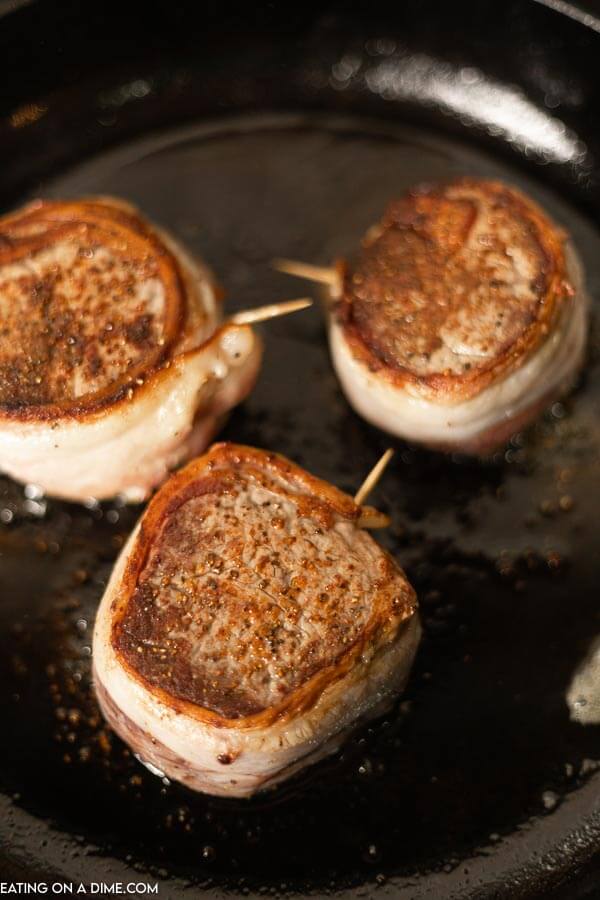 Bacon Wrapped Filet in skillet. 