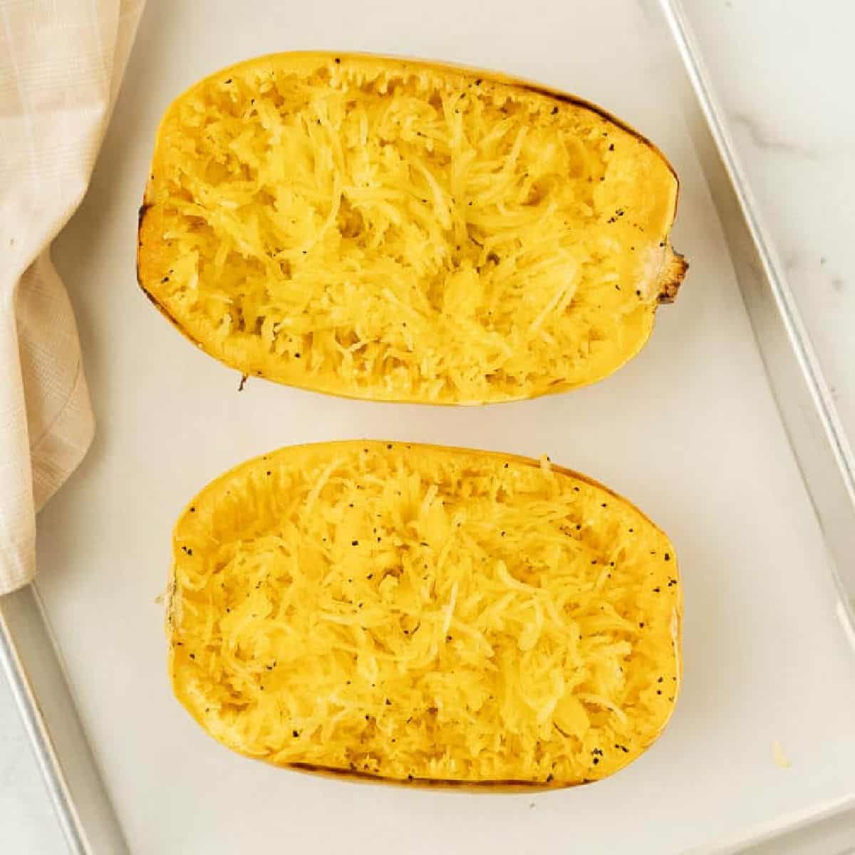 Close up image of cooked spaghetti squash. 