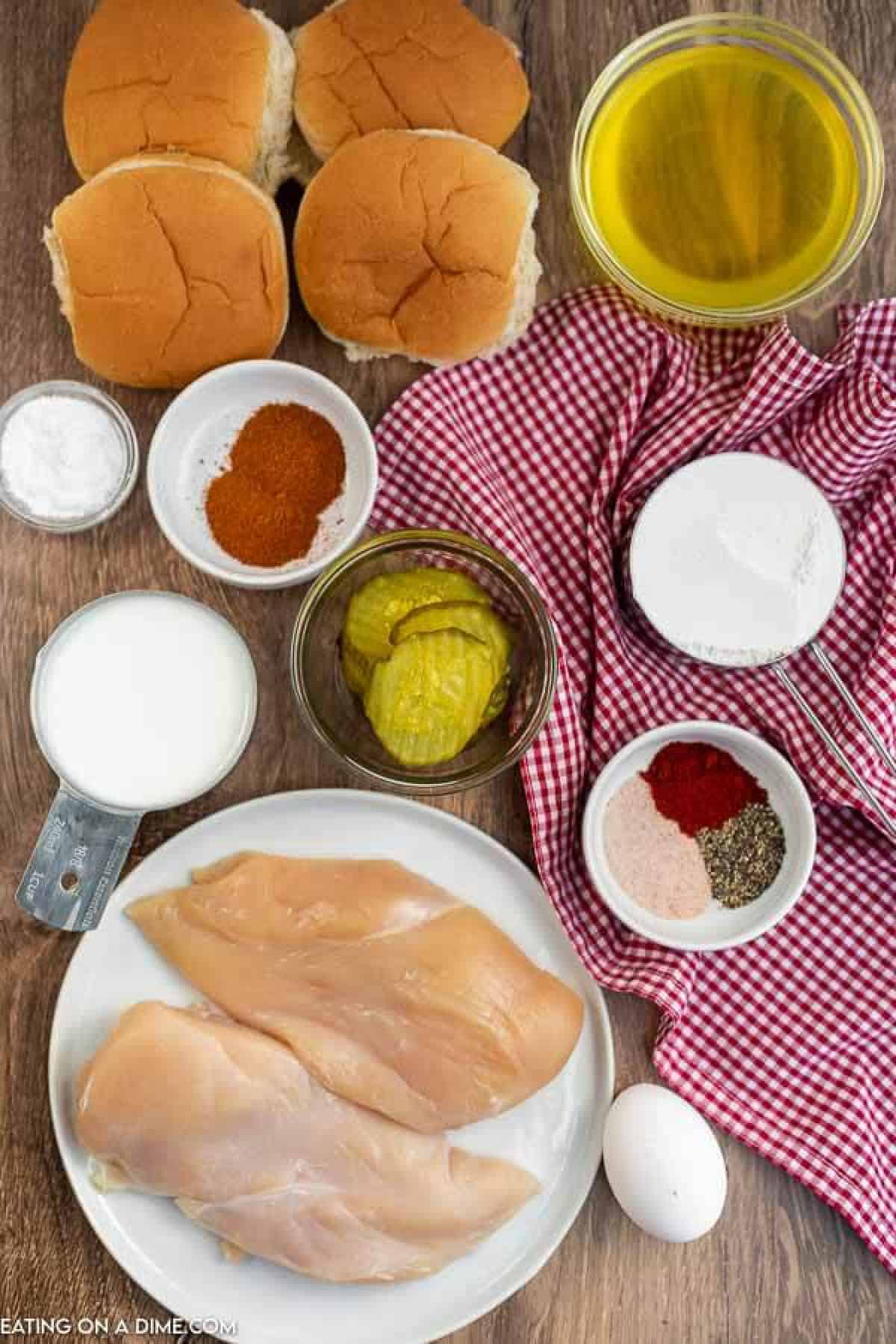Ingredients for recipe: chicken, seasoning, milk, pickle juice, flour. 