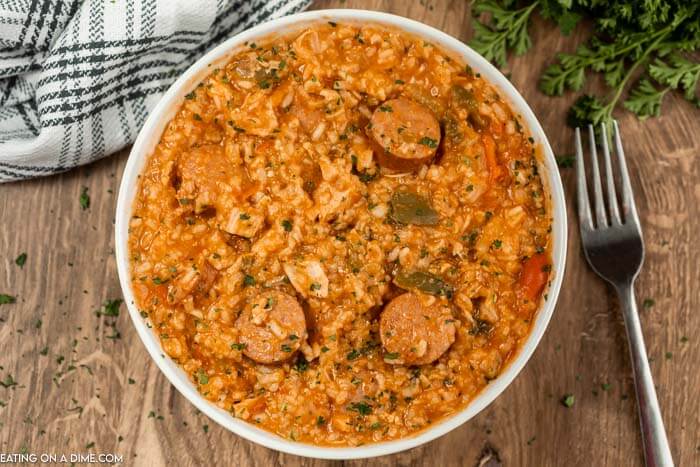 Close up image of chicken jambalaya in a white bowl