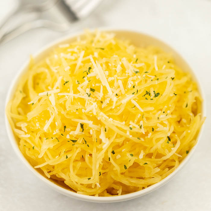 Spaghetti squash seasoned in a bowl. 