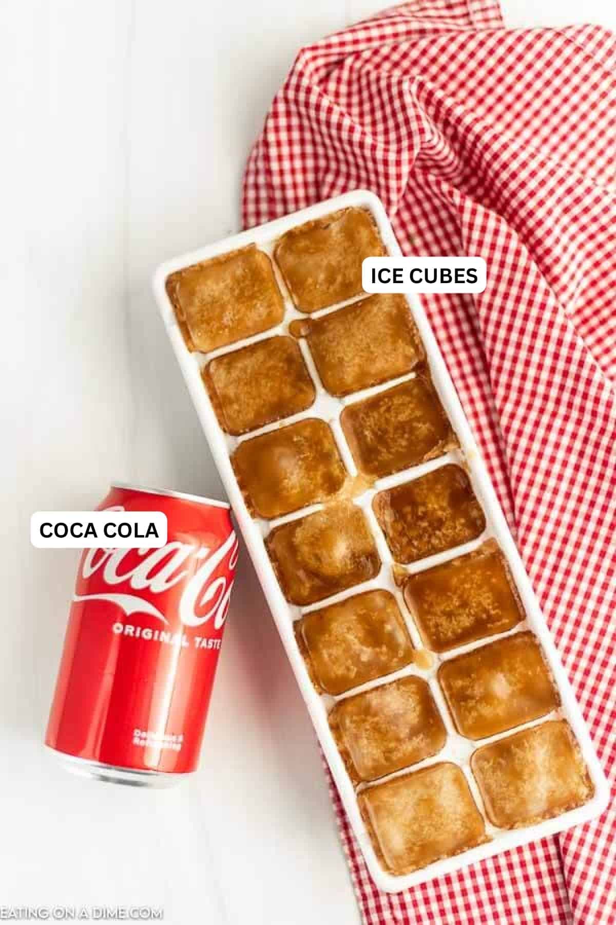 Ingredients for recipe: coca cola and ice cubes.