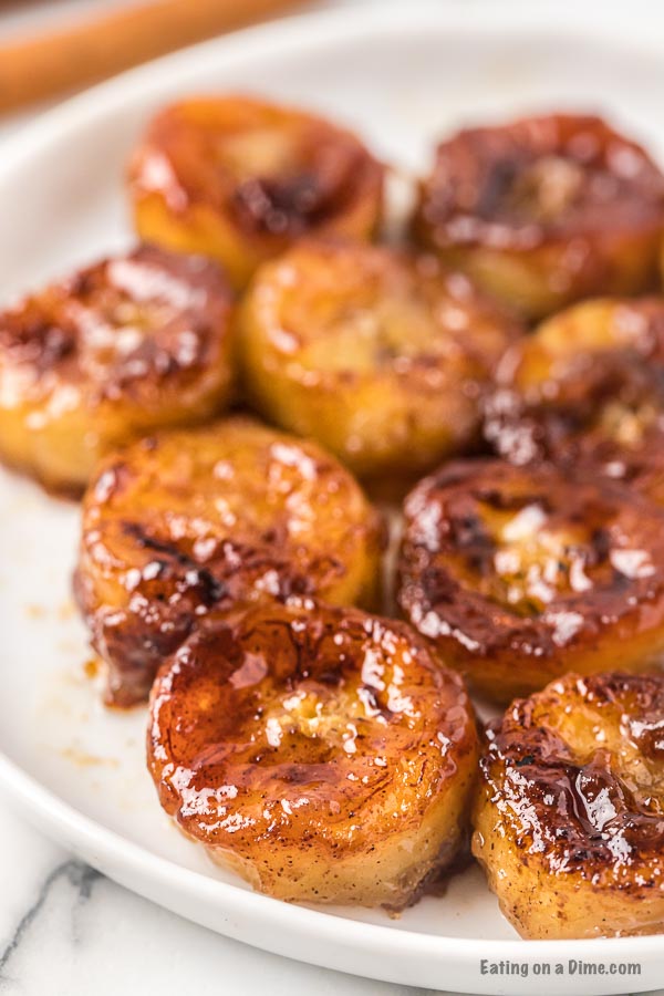 Close up image of fried bananas on a plate