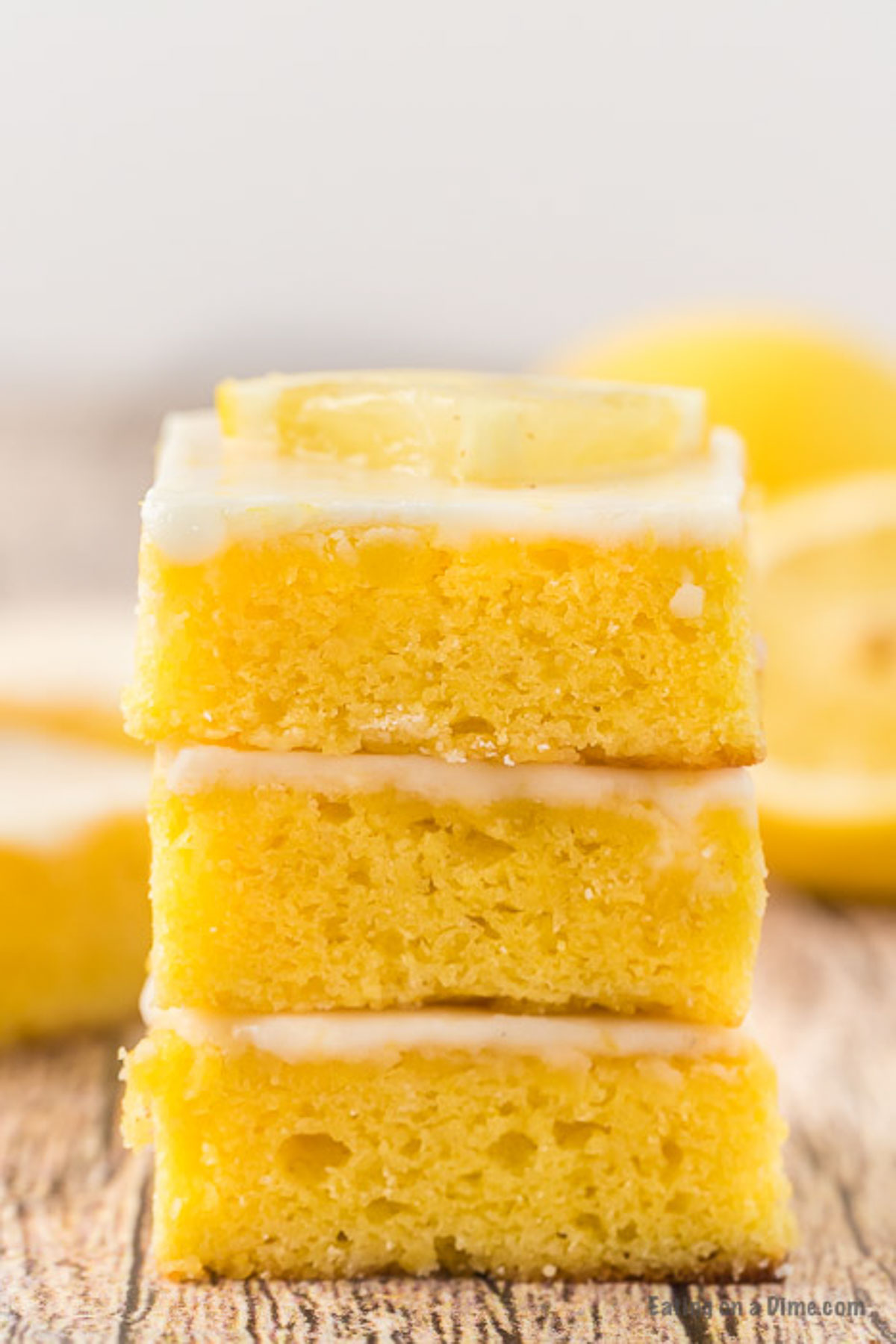 Close up image of lemon brownies stacked. 