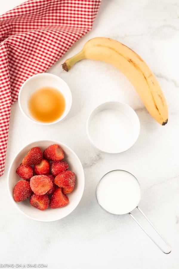 Ingredients needed - Frozen Strawberries, banana, sugar, vanilla, milk, ice cubes