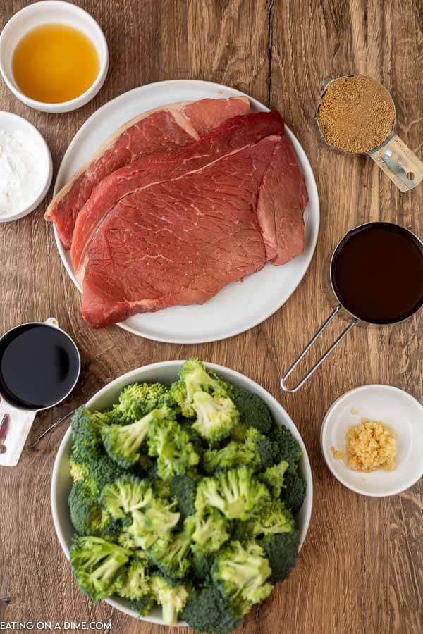 Ingredients needed - round steak, beef broth, soy sauce, garlic, brown sugar, sesame oil, cornstarch, broccoli sesame seeds