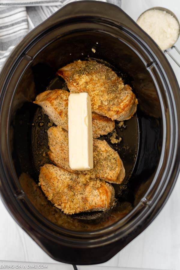Chicken in slow cooker with butter. 