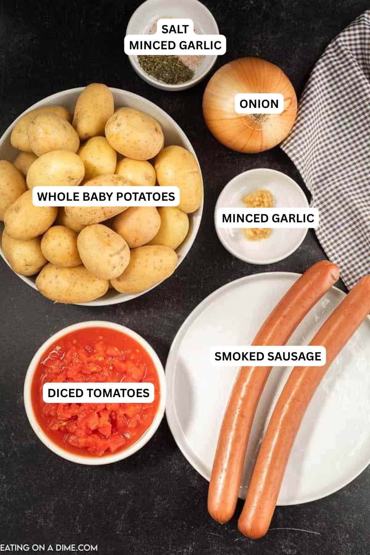 Your family will love this simple Crock Pot Sausage and Potatoes recipe. Toss everything into the crockpot for a tasty dinner everyone will enjoy. Ingredients for recipe: whole baby potatoes, smoked sausage, onion, diced tomatoes, salt, garlic, Italian seasoning and chicken broth.