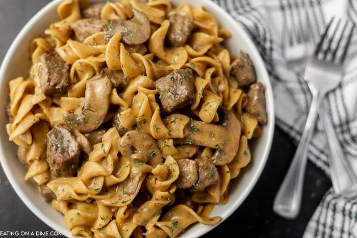Close up image of beef stroganoff in the white bowl. 