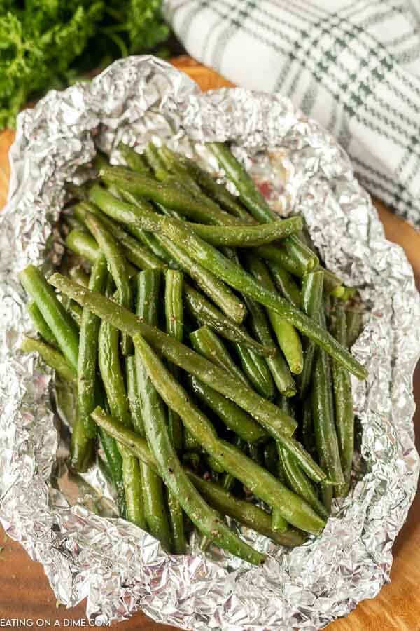 Close up image of green beans in a foil pack