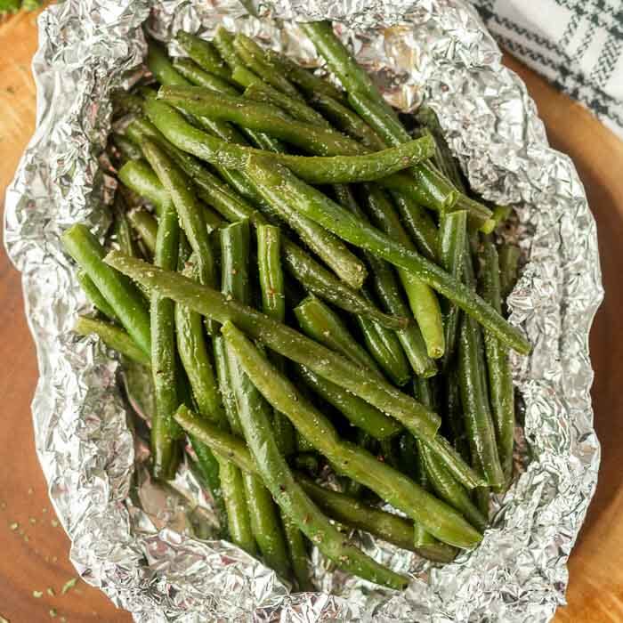 Close up image of green beans in a foil pack