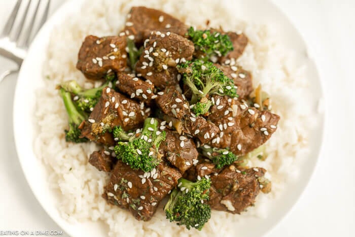 Close up image of beef and broccoli over rice