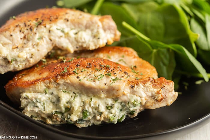 Baked Stuffed Pork Chops on a plate. 