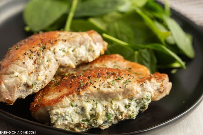 Baked Stuffed Pork Chops on a plate. 