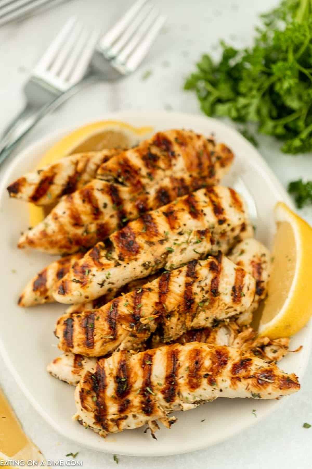 Grilled Chicken Tenders on a plate. 