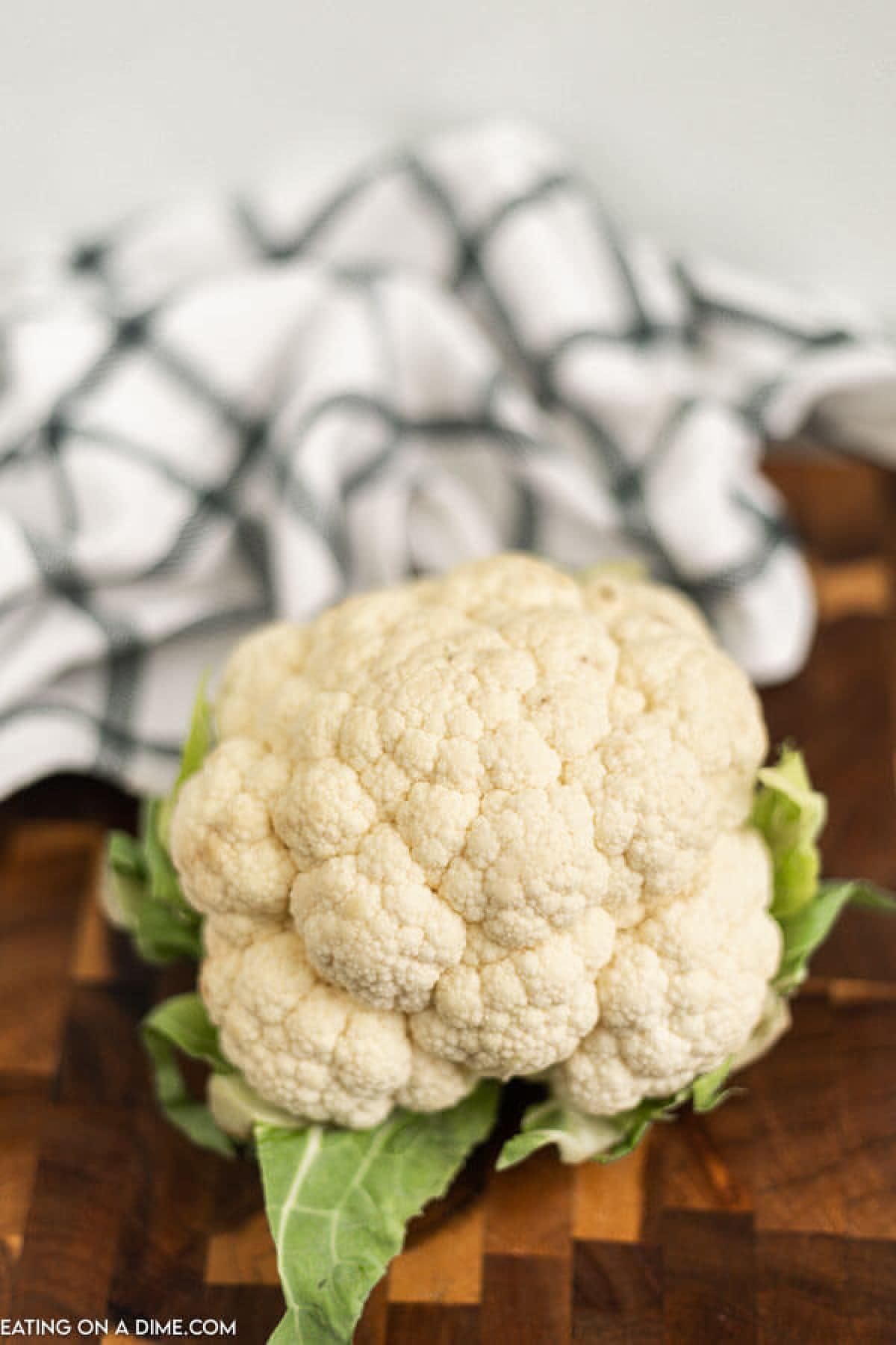 Whole Cauliflower on a cutting board