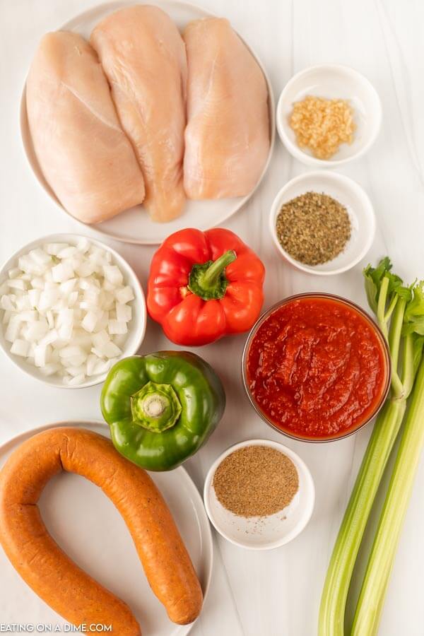Ingredients needed - chicken, cajun seasoning, sausage, onion, celery, peppers, garlic, crusted tomatoes, oregano, broth rice