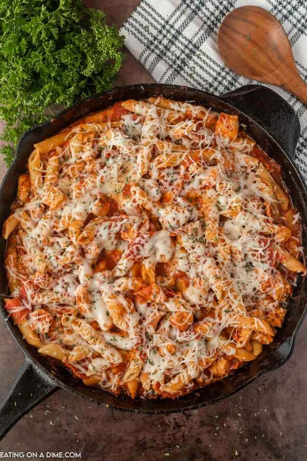 Close up image of Chicken Pepperoni Pasta in an iron skillet. 