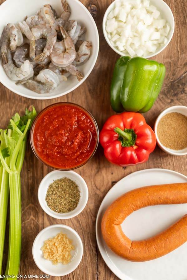 Ingredients needed - sausage, cajun seasoning, onion, celery, bell peppers, minced garlic, crushed tomatoes, oregano, chicken broth, shrimp, rice