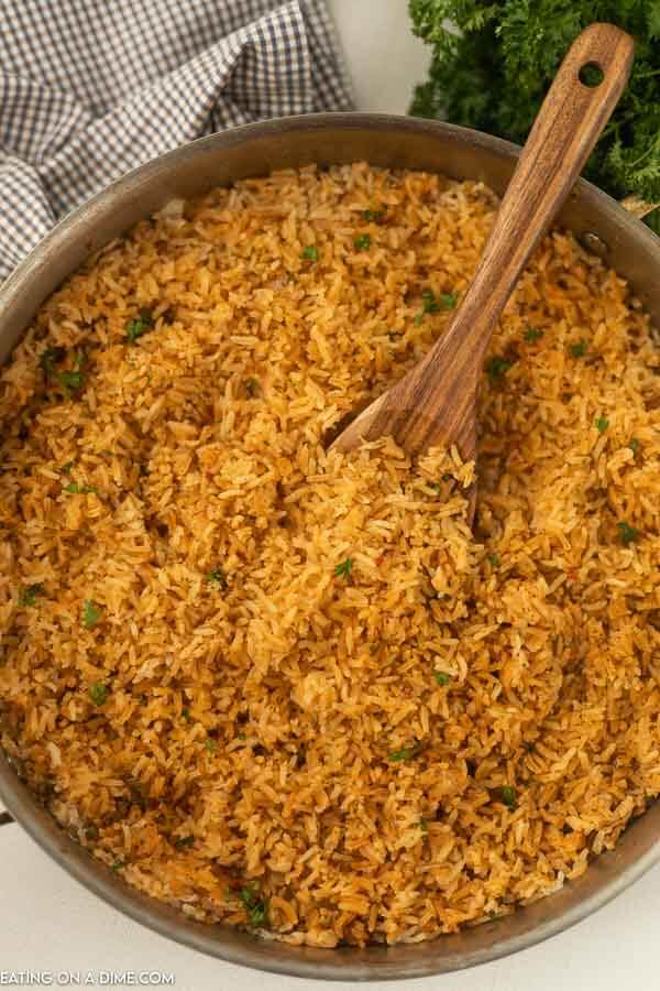 Texas Roadhouse Seasoned Rice in a skillet. 