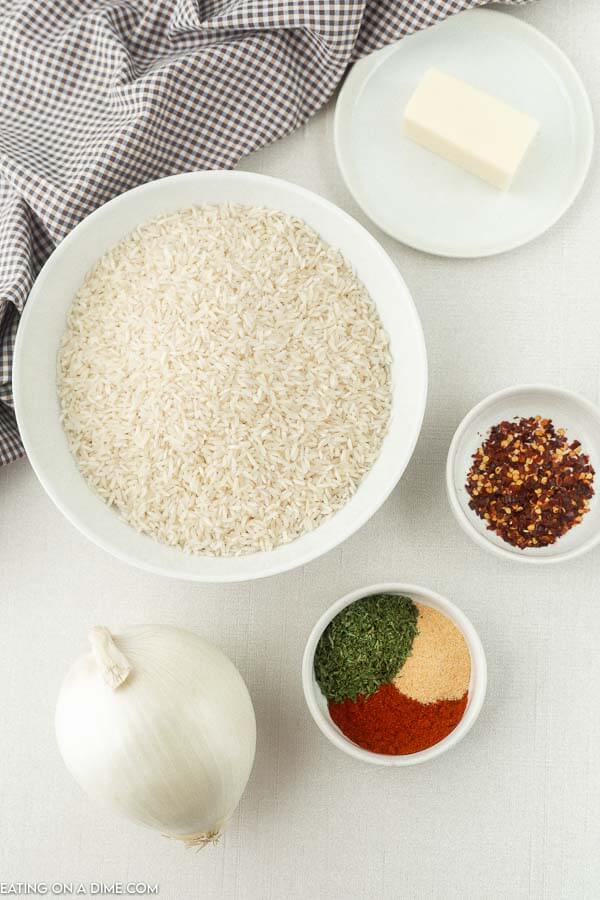 Ingredients for recipe: rice, seasoning, butter, onion. 